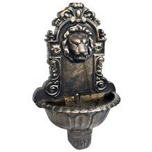   Fontanna ścienna z głową lwa, brązowa